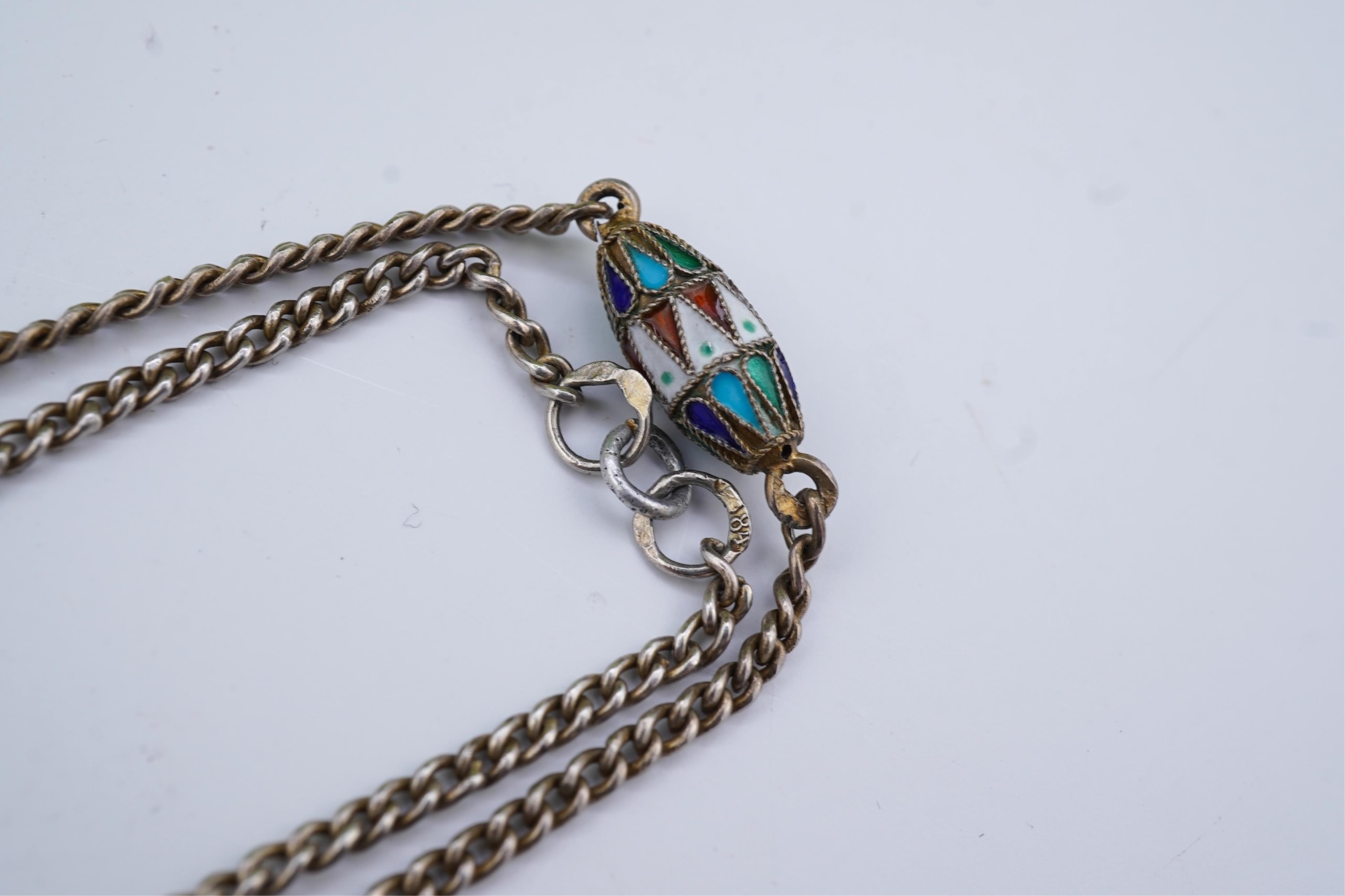 A silver and enamel long chain necklace, Russia, early 20th century